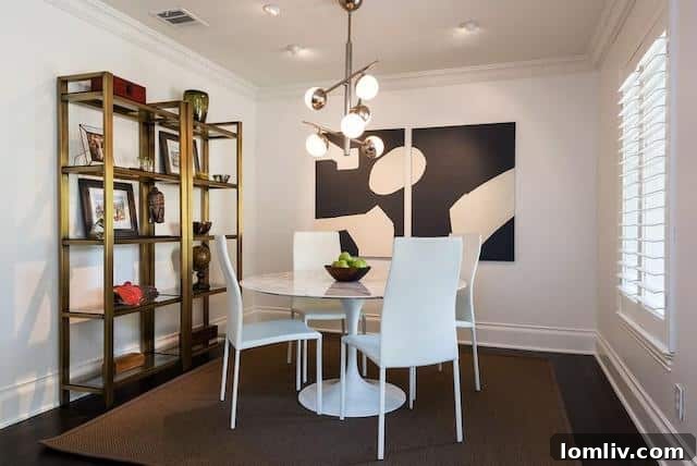 Modern kitchen in 4160 Lively Lane, featuring high-end appliances, an island, and sleek design.