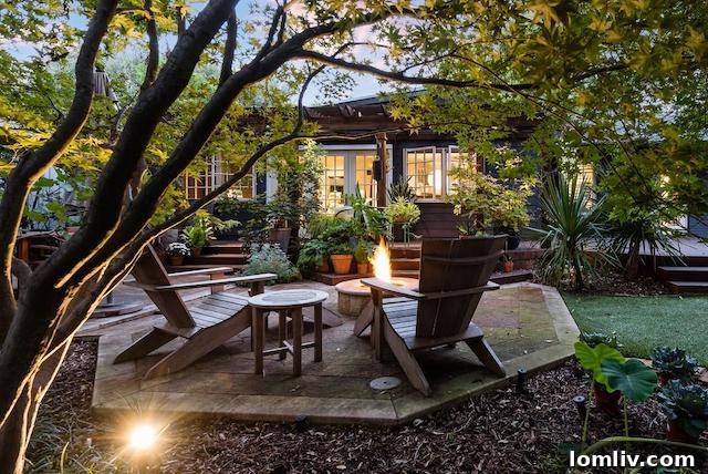Beautifully manicured garden and exterior of 4160 Lively Lane, emphasizing its curb appeal.