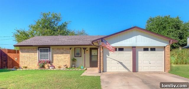 Charming brick home exterior in Watauga, Tarrant County, Texas