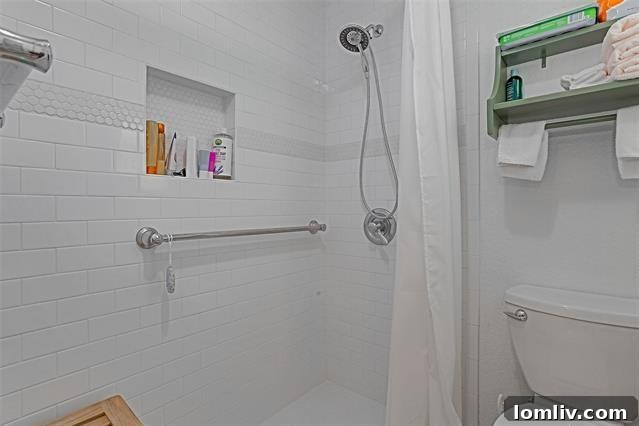 Modernized bathroom with white subway tile and octagonal penny tile floor