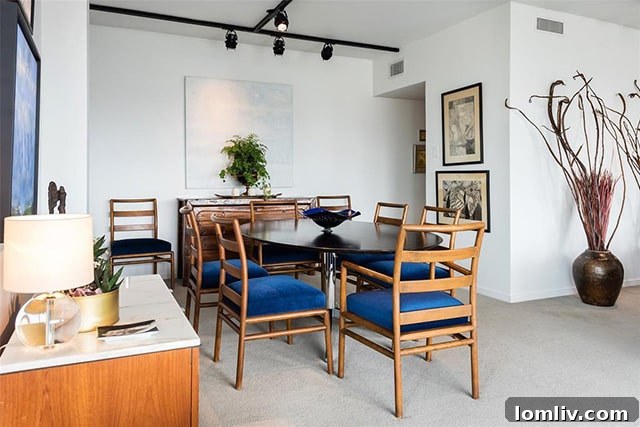 Spacious primary bedroom with luxurious decor and ample natural light