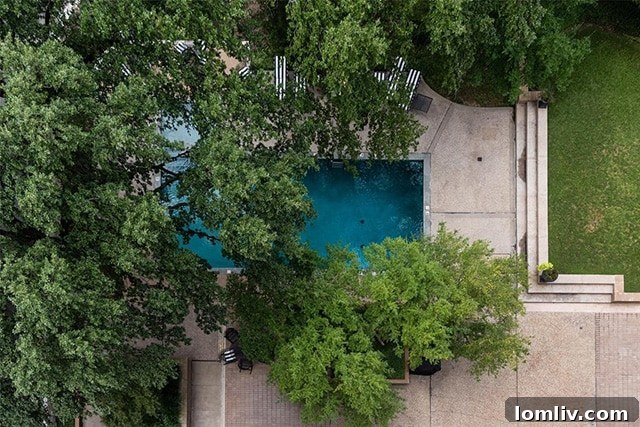 Heated swimming pool amenity at Park Towers Dallas