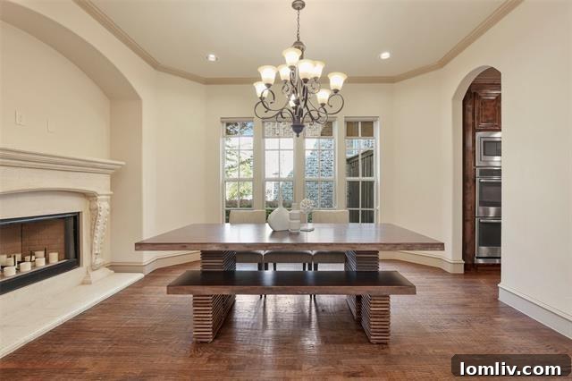 Spacious and bright living area with modern fireplace in Hollywood Heights home