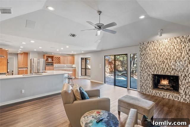Outdoor kitchen and living area with fireplace