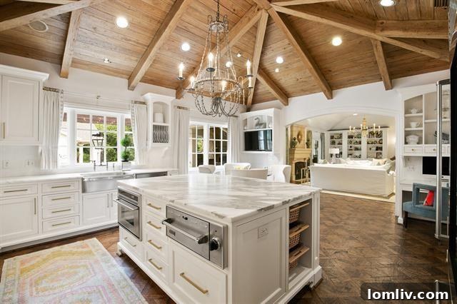Family room with vaulted ceiling, stone fireplace, and parquet floors
