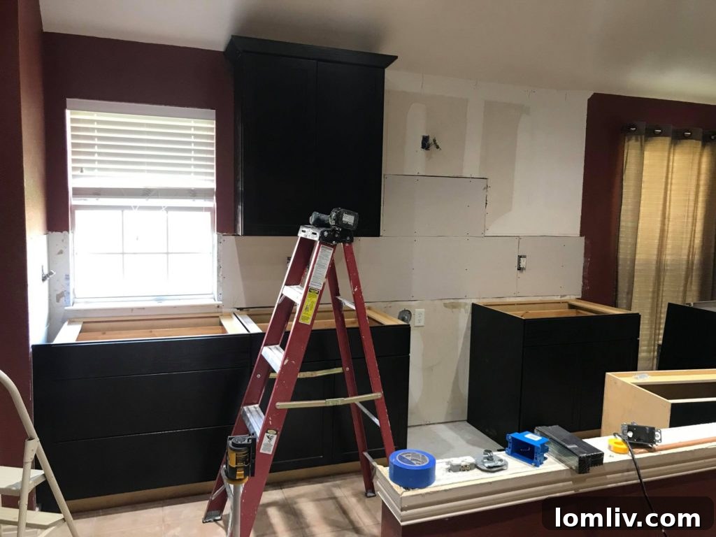 Couple working together on home remodel DIY project