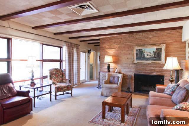 The living area before its transformative redesign, showing an enclosed feel.