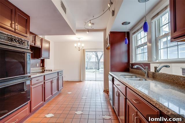 Classic kitchen with potential for modern upgrades, retaining its traditional charm.