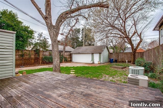 Spacious outdoor area ideal for relaxation and entertaining, with potential for deck renovation.