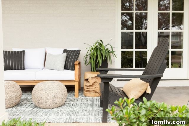 2021 Interior Design Forecast 7 Interior dining space featuring relaxed woven chairs and natural wood table.