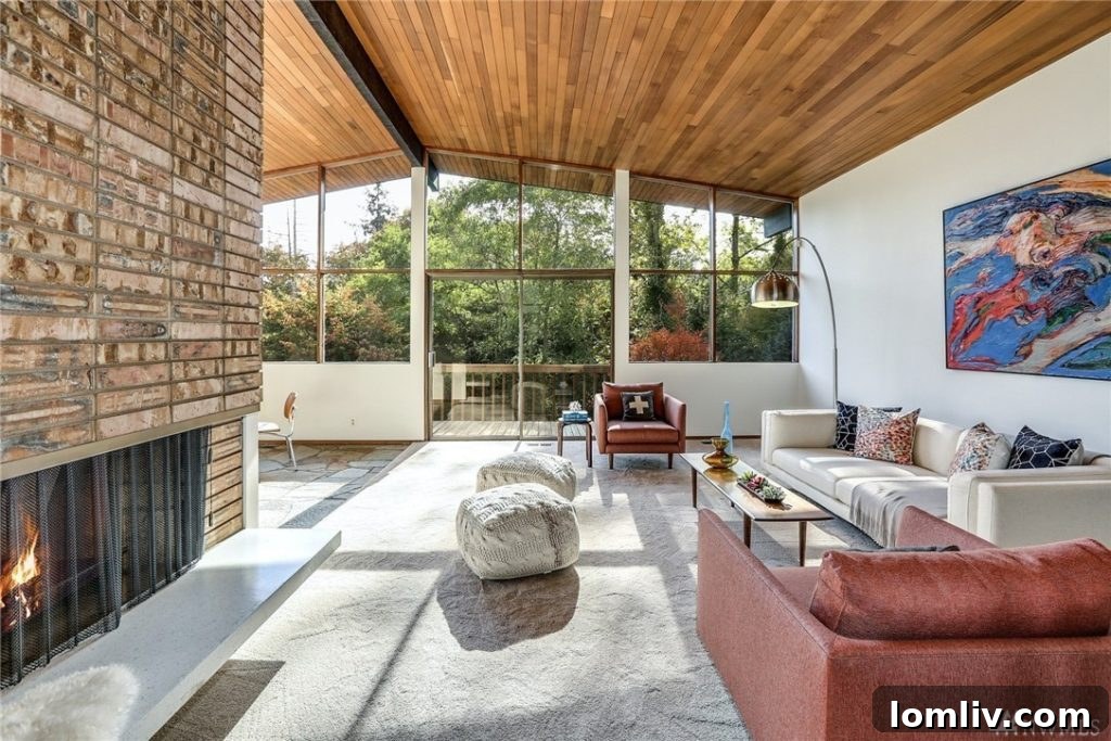 Interior shot showing Mid-Century Modern decor and large windows