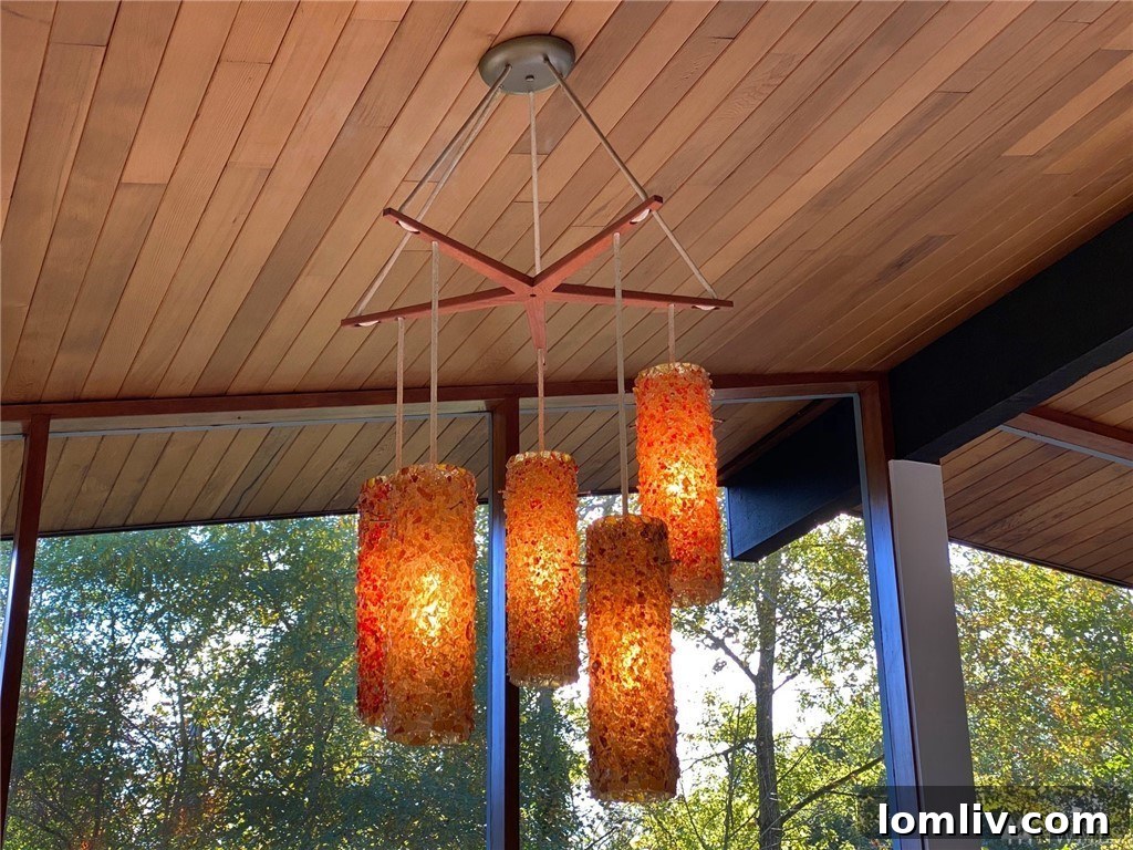 Elegant Mid-Century Modern light fixture in a hallway