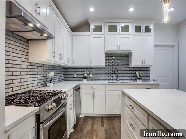 Stylish kitchen with quartz waterfall island and modern cabinetry