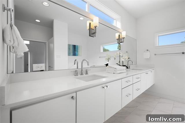 Spacious living area with oversized windows, filling the interior with natural light and offering city views.