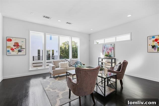 Modern kitchen with white quartz countertops, sleek custom cabinets, and a convenient wine fridge, ideal for urban living.