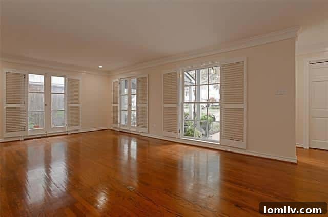 Detail view of elegant French doors and pristine hardwood floors