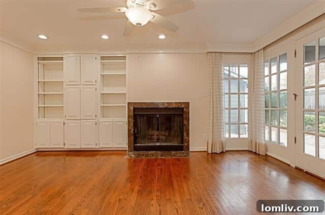 Comfortable main living area with wood-burning fireplace and large windows