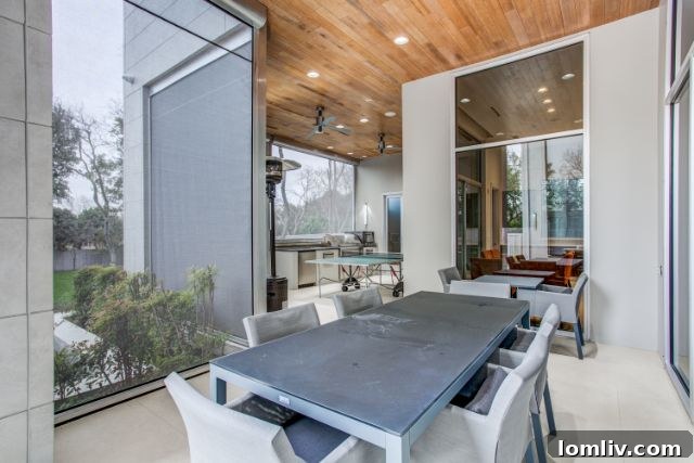 Luxurious outdoor kitchen and entertainment area at 6517 Dykes Way Dallas
