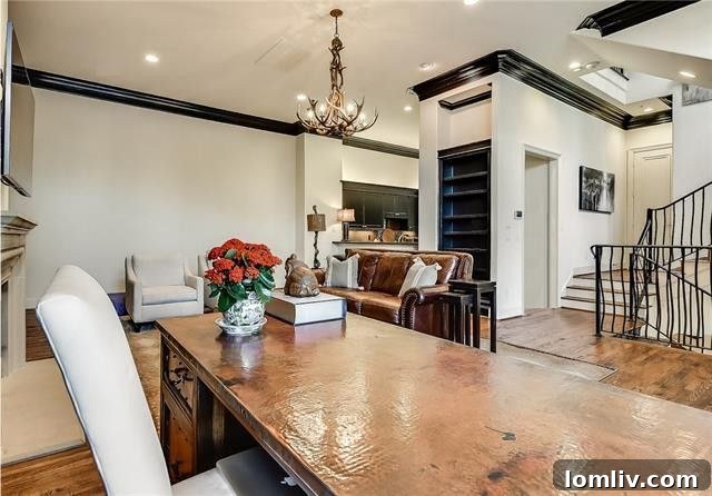 Luxurious living room with soaring 12-foot ceilings and designer decor in a high-end Oak Lawn townhome