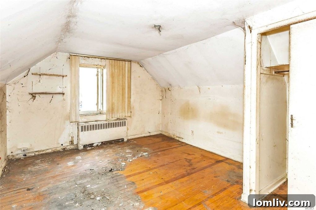Unidentifiable room showing extreme water damage, structural compromise, and debris