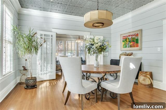 Discover Your New Year's Home: East Dallas Open House Debut 8 Bright dining area featuring tin ceilings and shiplap walls