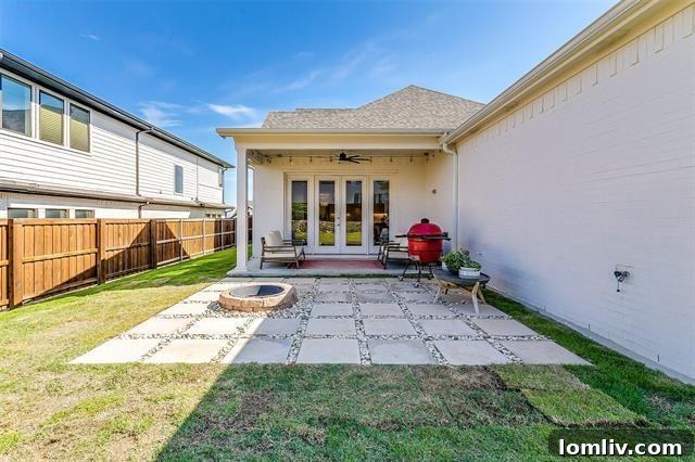 Private fenced backyard with a patio, ideal for outdoor entertaining and relaxation at 1848 Crested Ridge Road