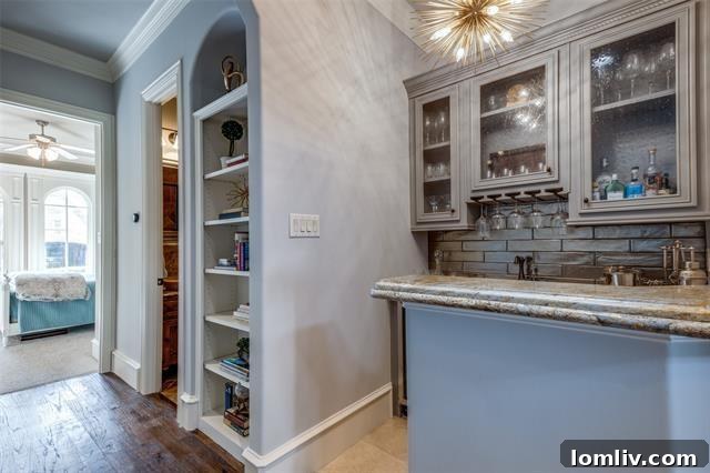 Luxurious master bathroom with dual vanities and elegant finishes, offering a serene retreat.