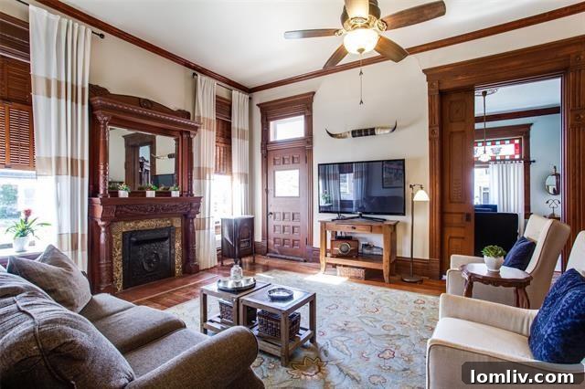 Spacious Interior with Ornate Woodwork and Original Details in Historic Gainesville Home