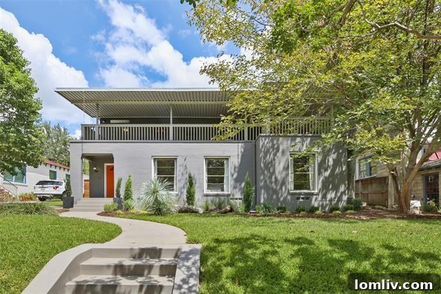 The stunning exterior of a Hollywood Heights home, showcasing its unique Spanish-style architecture with a spacious front porch and elegant design details. Perfect for families, this property offers curb appeal and a warm welcome.