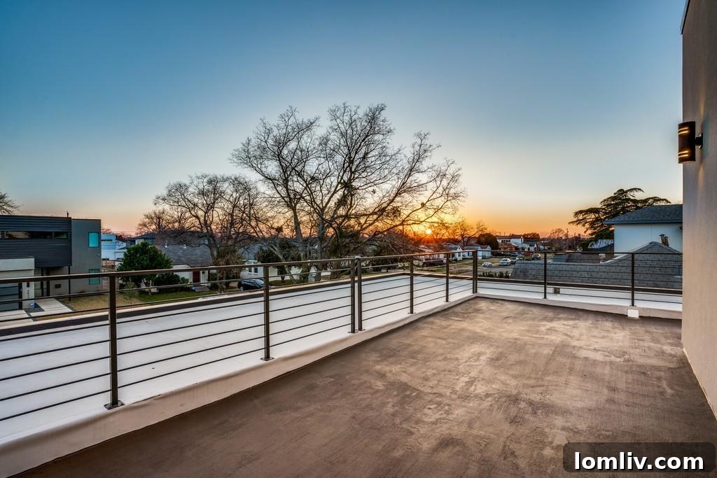 Spacious rooftop deck with seating and city views