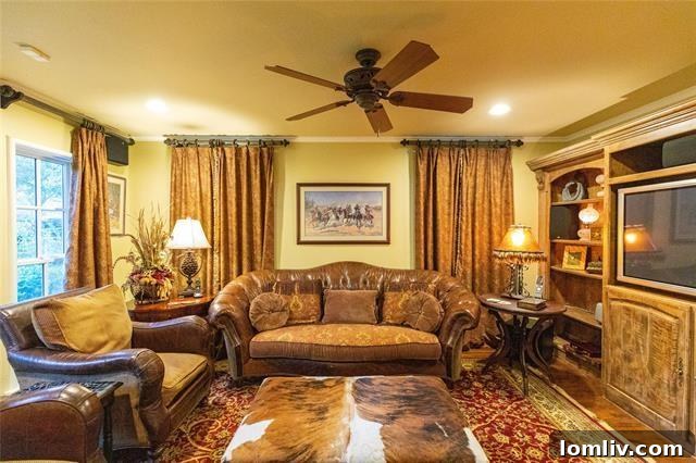Spacious Formal Living Room with Fireplace and Hardwood Floors