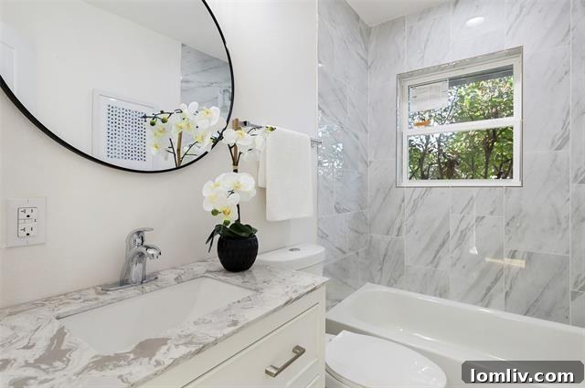 Lush, treed backyard offering privacy and space at 2461 Hartline Drive