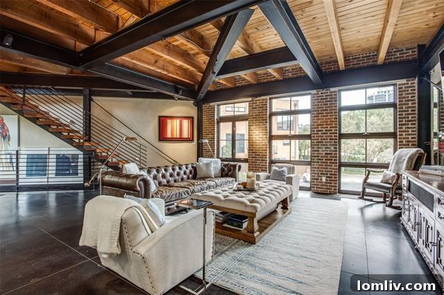 Three-Story Haven Where Only The Views Reign Supreme 4 Modern kitchen island flowing into the living area of the Dallas townhouse
