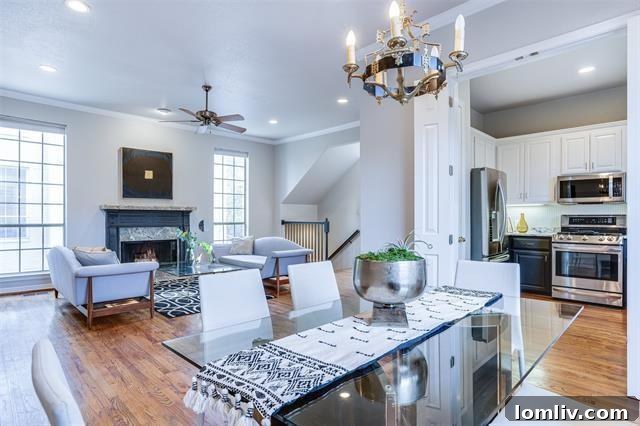 Elegant Living Room with Hardwood Floors and Fireplace in Dallas Condo