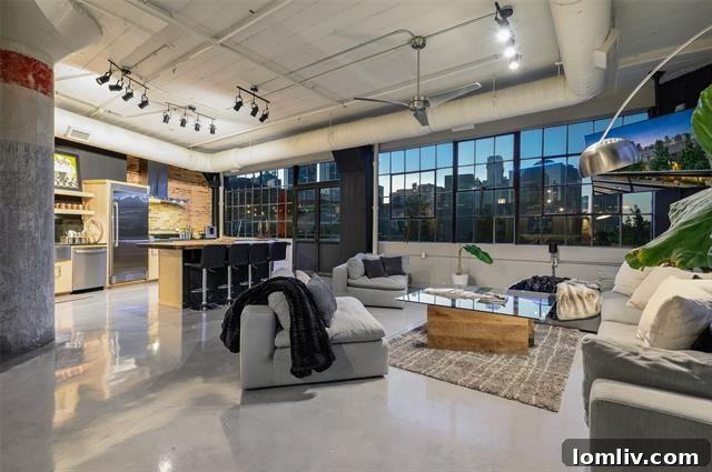 Expansive living room in a Dallas loft with abundant natural light
