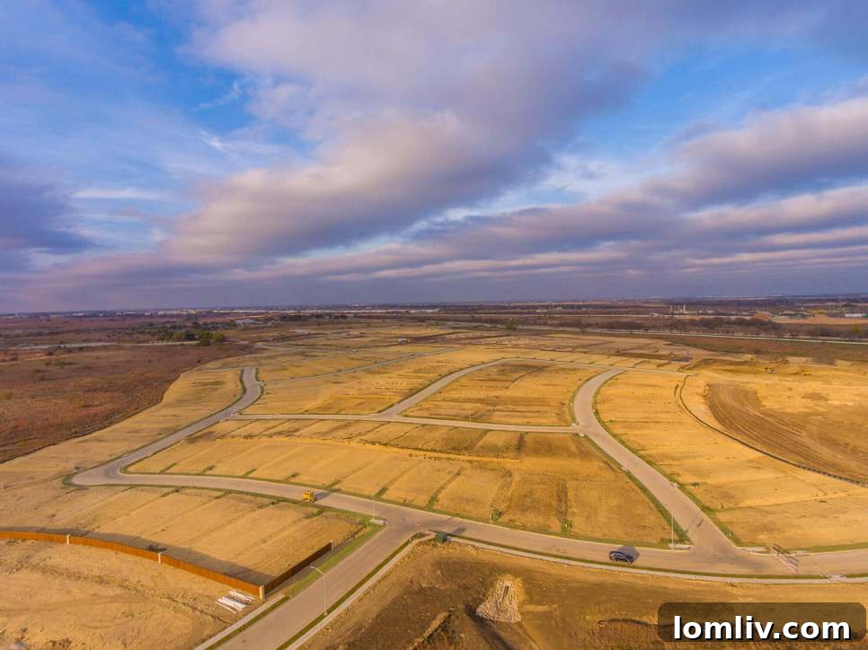 Developers Co-Develop Eagle Mountain Lake Master-Planned Community 3 An aerial perspective revealing the expansive, developing residential lots within Cibolo Hills, illustrating the flat, buildable terrain ready for new homes in this North Fort Worth master-planned community. The landscape, while extensive, features no significant elevation changes, a curious contrast to its namesake. (Meritage Homes)
