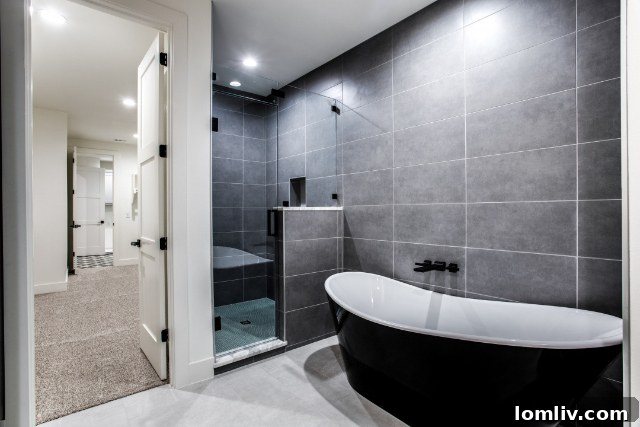 Bedroom featuring sophisticated decor and ample natural light