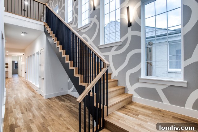 Closer look at the elegant facade and entryway of the Modern Tudor duplex