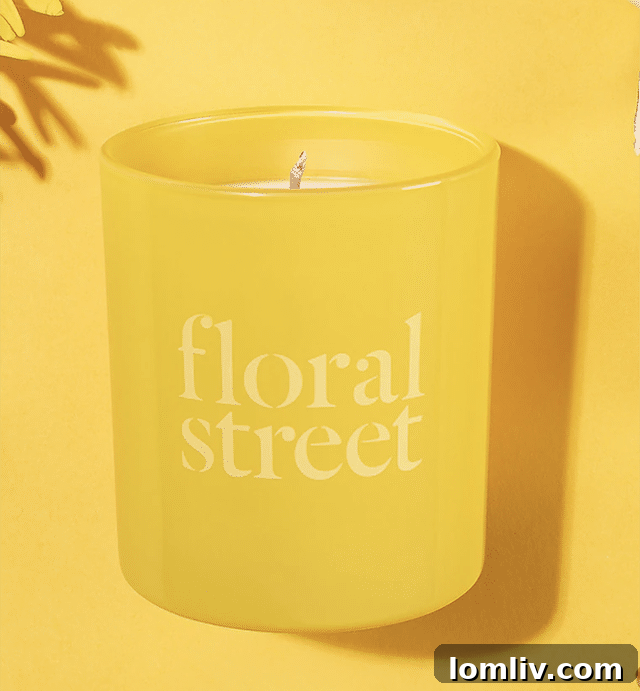 Floral Street's Sunshine Bloom scented candle, evoking a warm and sunny day