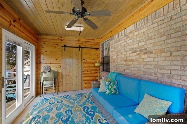 Outdoor swimming pool area with wooden cabana and open skies