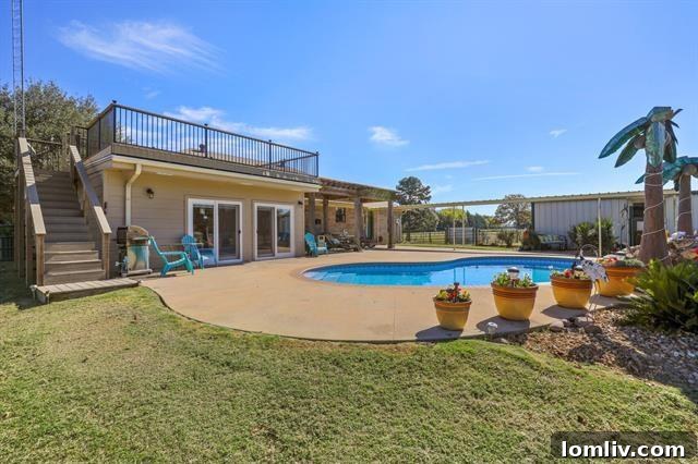 Spacious horse barn and arena, ideal for equestrian activities
