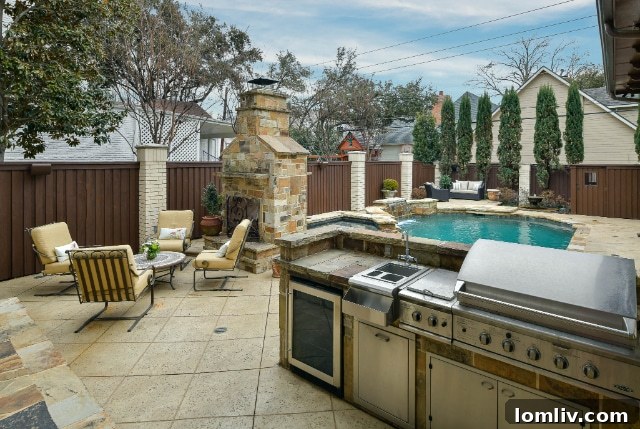 Saltwater Pool and Alfresco Dining Area in Backyard Oasis