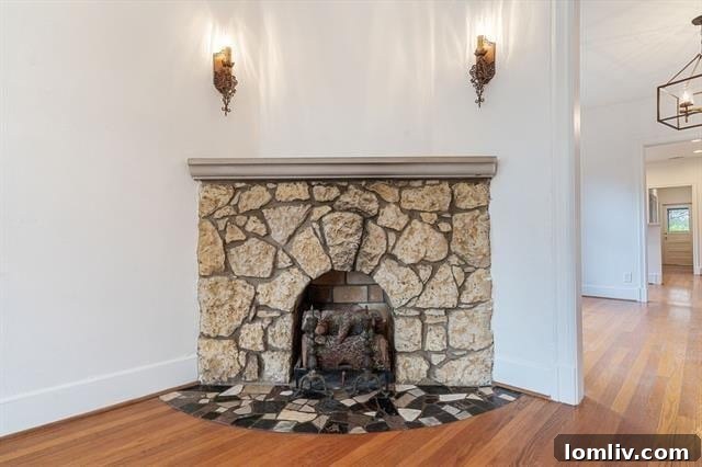 Cozy outdoor fire pit area surrounded by greenery, perfect for entertaining at 1402 Seevers Avenue