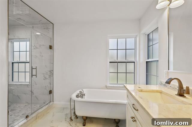 Elegant interior detail of a master bathroom, highlighting the refined finishes and the luxurious ambiance of the spa-like retreat.