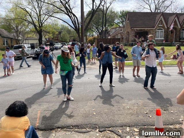 Neighbors dancing and enjoying the Hollywood Heights Easter parade