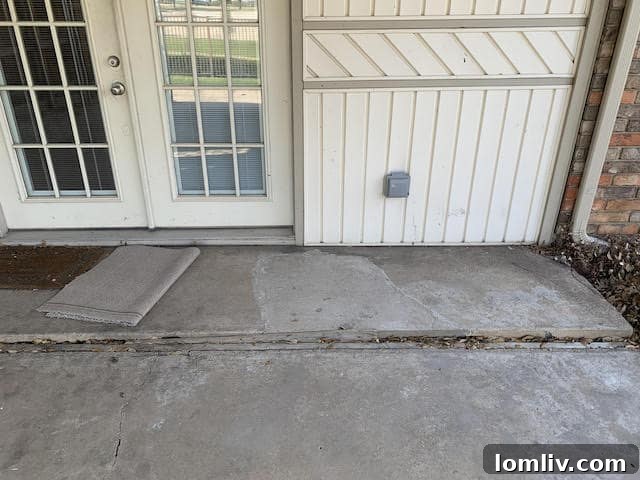 Fresh paint patch over a potential crack area