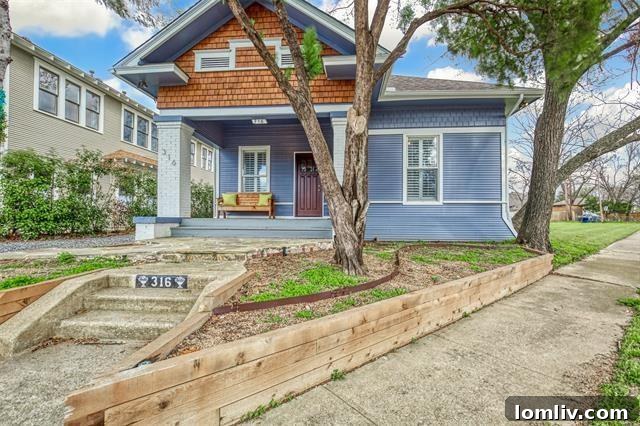 Inviting Blue Exterior Home with Wide Front Porch