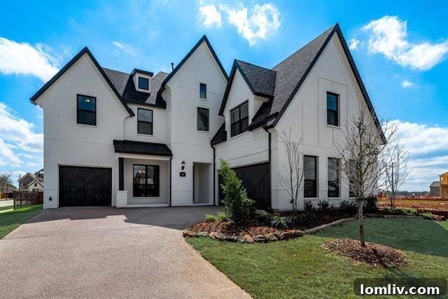 Luxurious new construction home in Frisco, Texas, featuring modern architecture and a pristine facade.