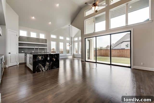 Luxurious master bathroom with high-end finishes, a spacious soaking tub, and a separate shower in a Frisco home.
