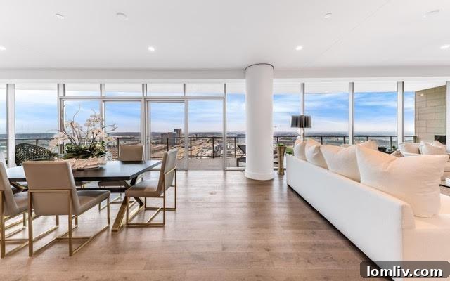 Elegant dining space in a Plano high-rise, perfect for entertaining with expansive city views through large windows.